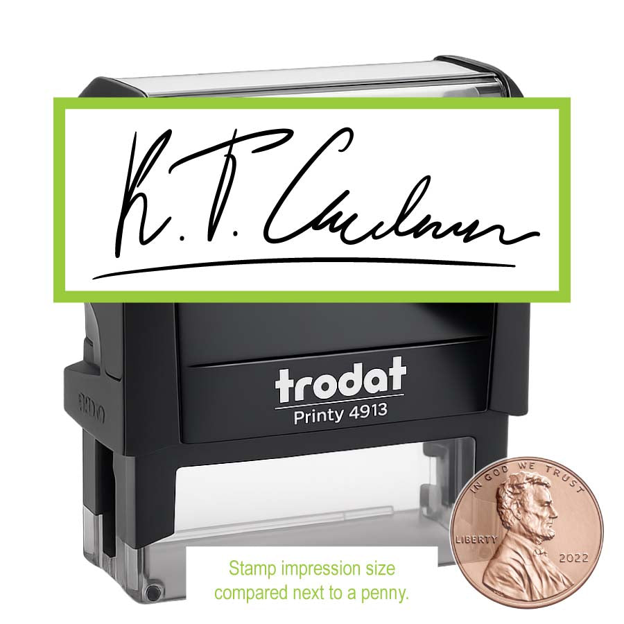 Black Trodat signature stamp with a penny for size comparison on a white background